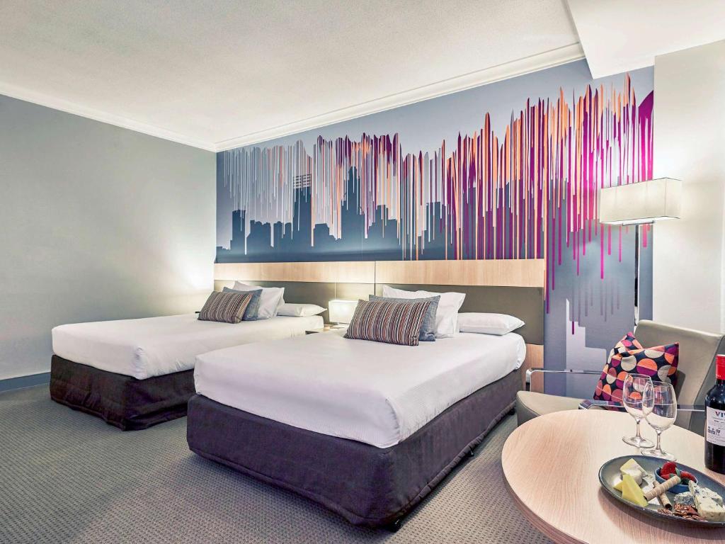 Postel nebo postele na pokoji v ubytování Mercure Perth