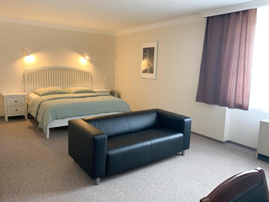 Postel nebo postele na pokoji v ubytování Hotel Pause