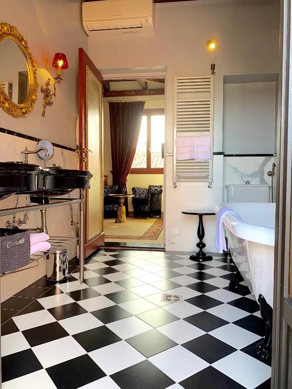Kuchyň nebo kuchyňský kout v ubytování Hotel La Calcina