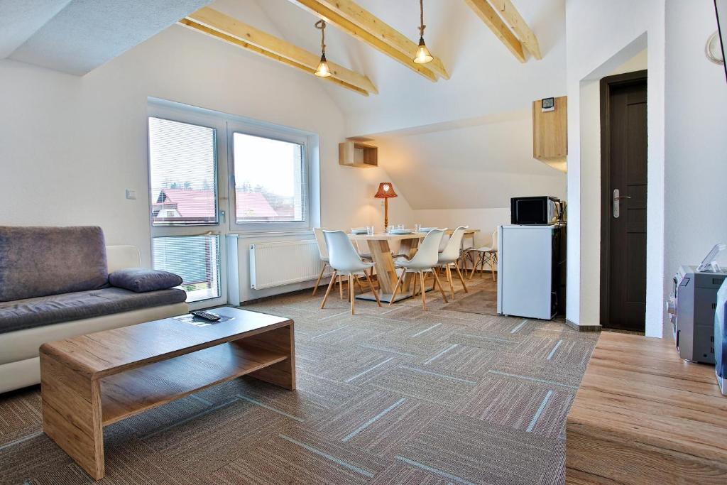 Posezení v ubytování Apartmany za Rohom