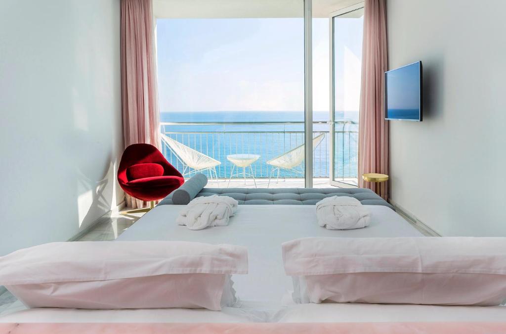 Postel nebo postele na pokoji v ubytování Hotel Aromar