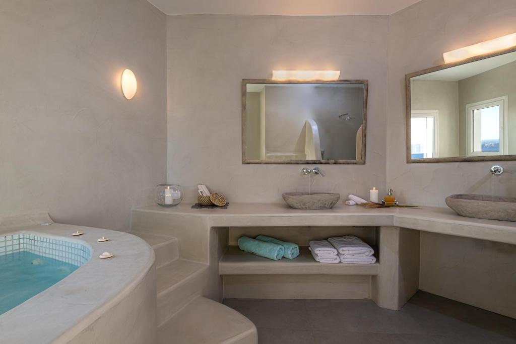 A bathroom at Adamant Suites