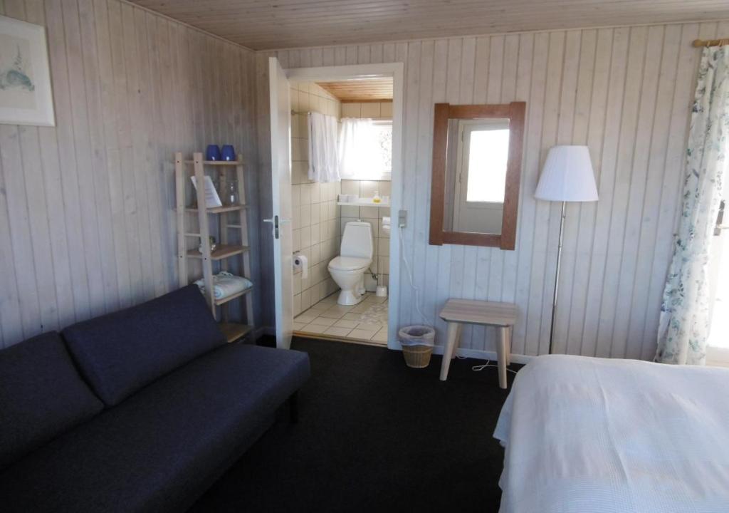 Postel nebo postele na pokoji v ubytování Munchs Badehotel