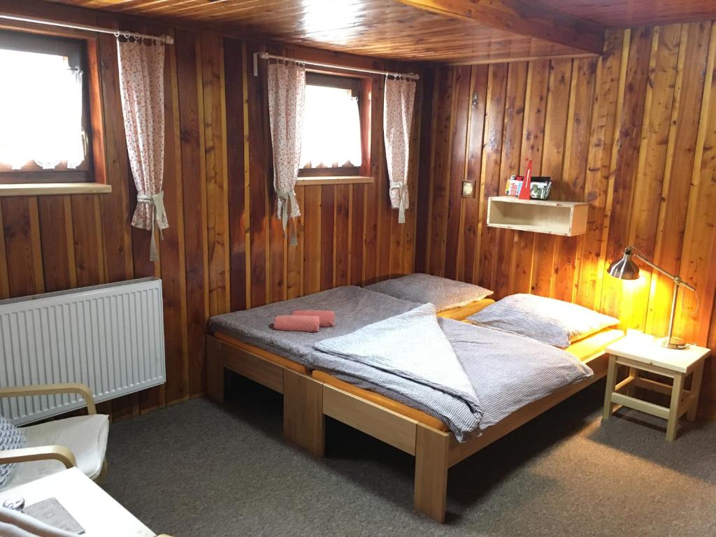 Postel nebo postele na pokoji v ubytování Penzion REHEK