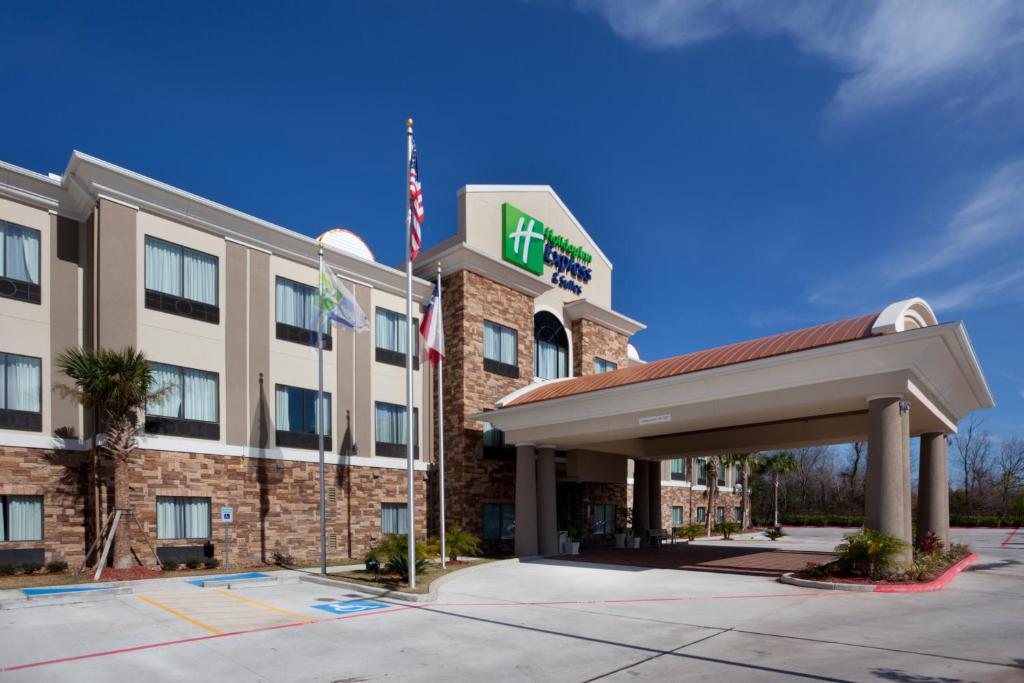 an image of a hotel with the front of the building at Holiday Inn Express Hotel & Suites Houston NW Beltway 8-West Road by IHG in Houston