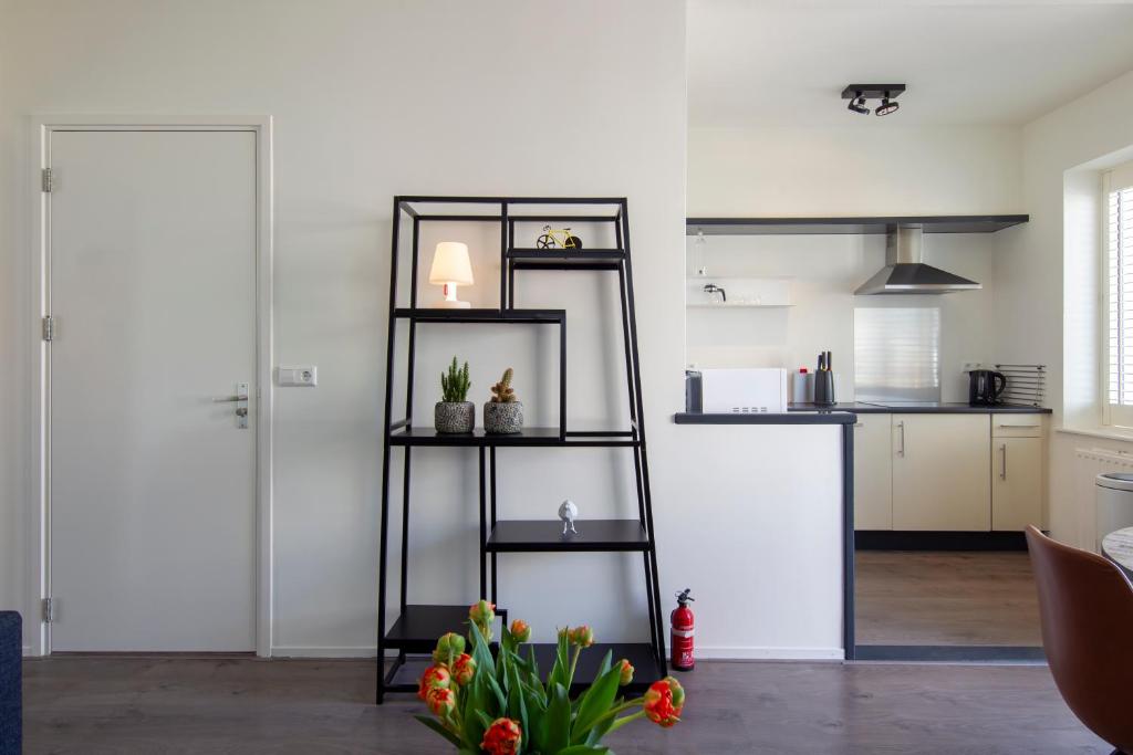 Cuisine ou kitchenette dans l'établissement Seapoint - Sea view