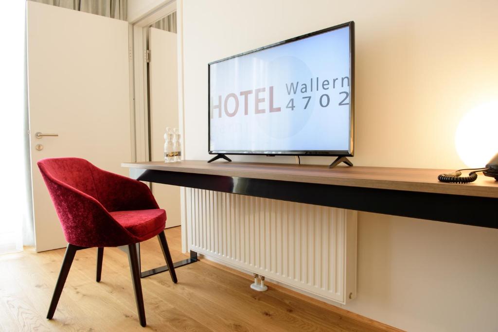 TV a/nebo společenská místnost v ubytování Hotel Wallern Garni