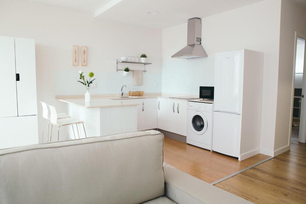 A kitchen or kitchenette at Estilo nordico Sardinero