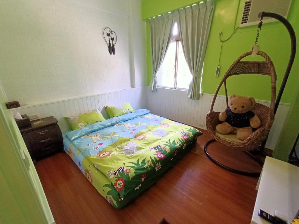 Postel nebo postele na pokoji v ubytování 水里河堤咖啡民宿 Shuili Heti coffee B&B