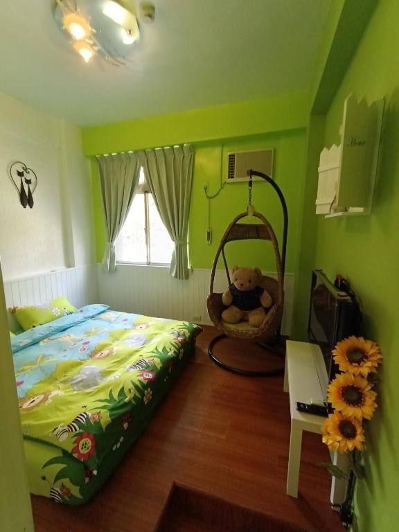 Postel nebo postele na pokoji v ubytování 水里河堤咖啡民宿 Shuili Heti coffee B&B