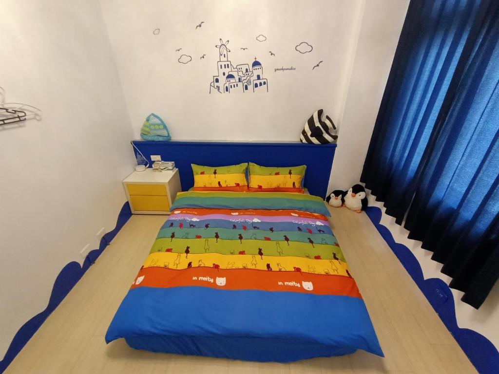 Postel nebo postele na pokoji v ubytování 水里河堤咖啡民宿 Shuili Heti coffee B&B