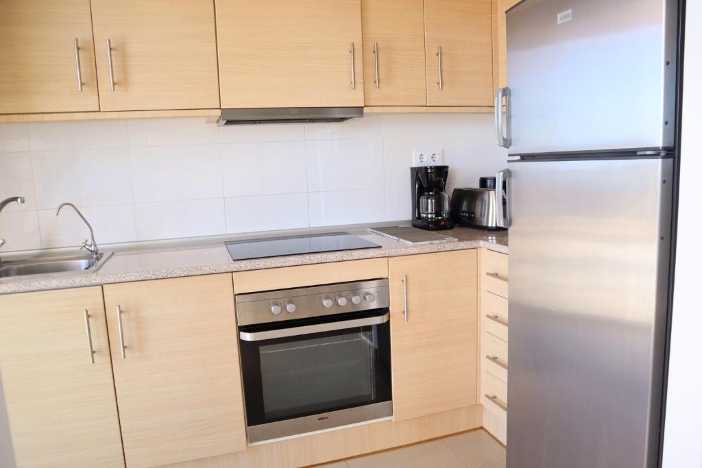 Kuchyň nebo kuchyňský kout v ubytování Sea view apartment Mojon hills