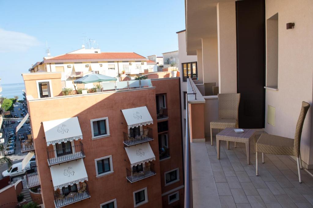 a view of a balcony of a building at Artemis Hotel in Cefalù