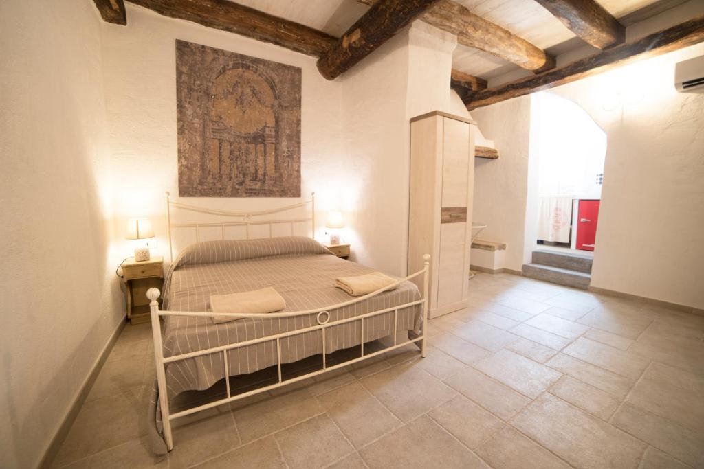 Postel nebo postele na pokoji v ubytování Aria di Vico Aparthotel