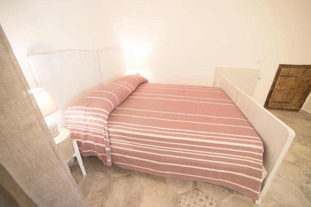 Postel nebo postele na pokoji v ubytování Aria di Vico Aparthotel