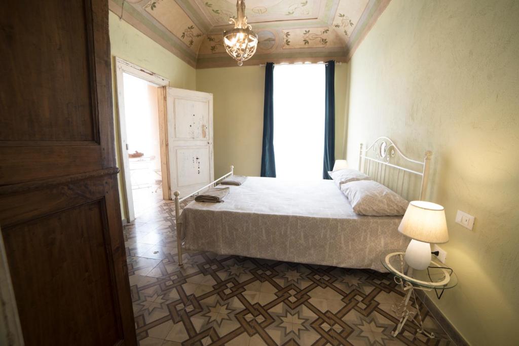 Postel nebo postele na pokoji v ubytování Aria di Vico Aparthotel