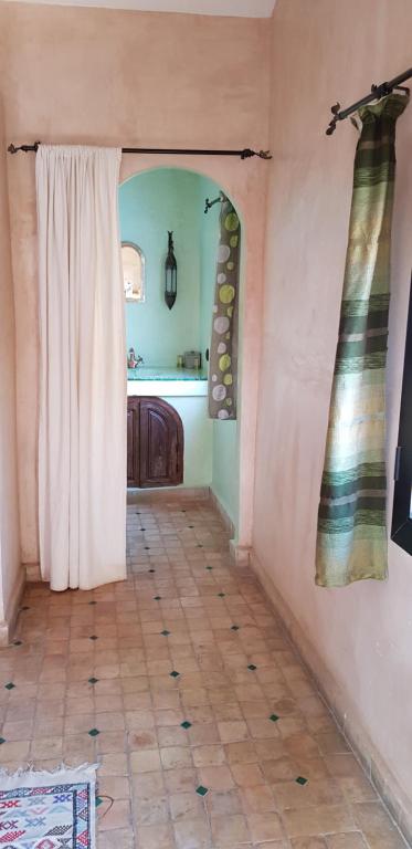 Postel nebo postele na pokoji v ubytování Riad Dar Bergui