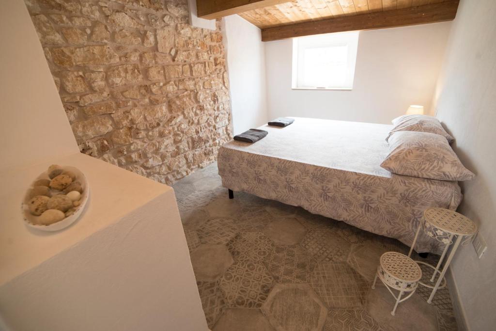 Postel nebo postele na pokoji v ubytování Aria di Vico Aparthotel