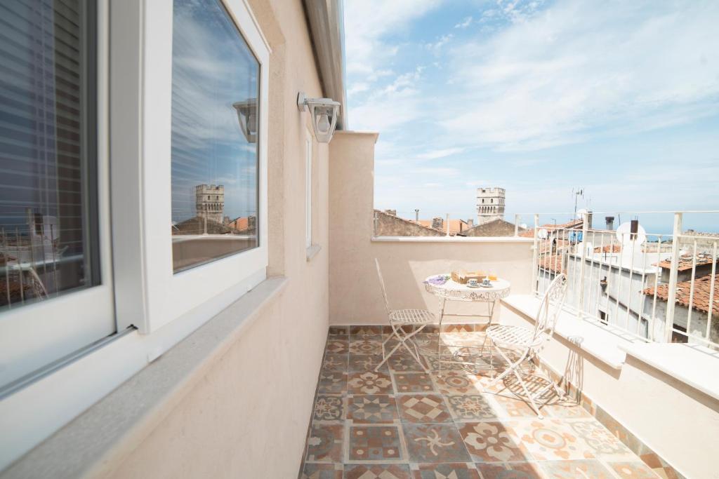Balkón nebo terasa v ubytování Aria di Vico Aparthotel