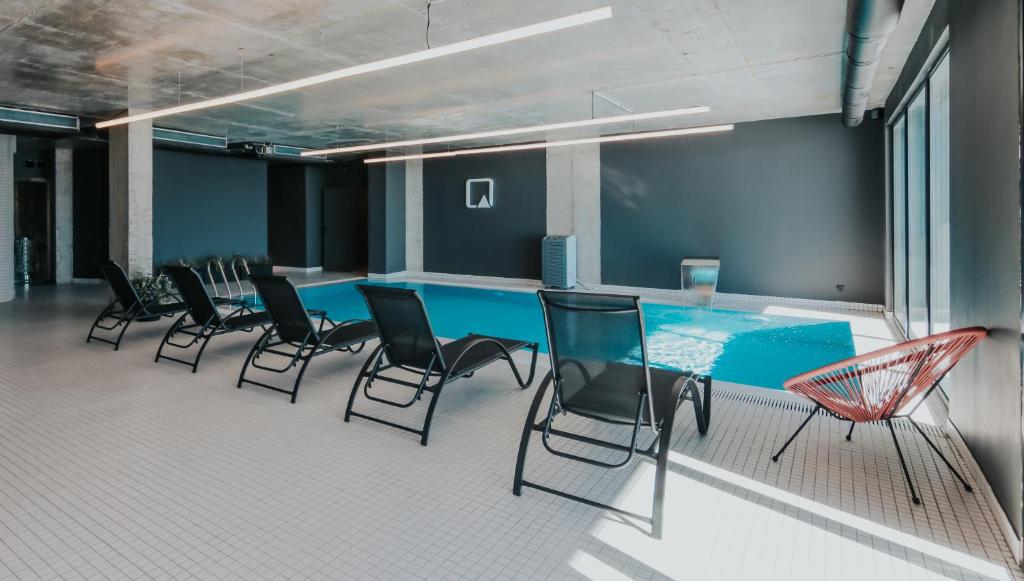 Posezení v ubytování Quadrum Hotel