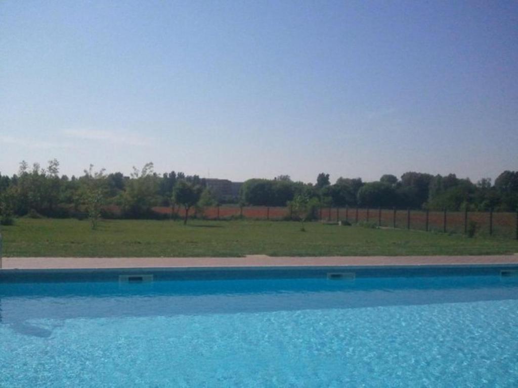 Bazén v ubytovaní Agriturismo Corte Trincerone alebo v jeho blízkosti