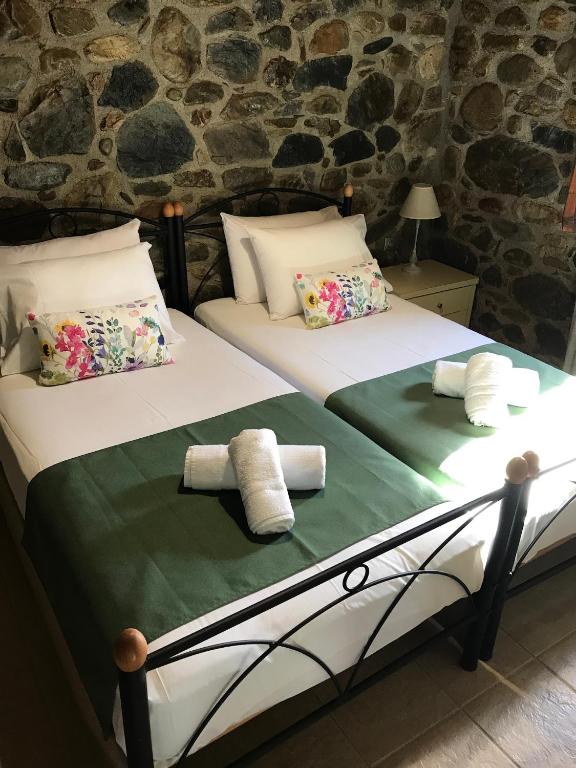 Postel nebo postele na pokoji v ubytování Villa Casa Avocado