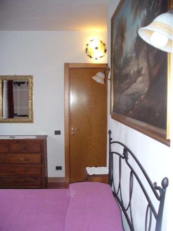 Posteľ alebo postele v izbe v ubytovaní Agriturismo Corte Trincerone