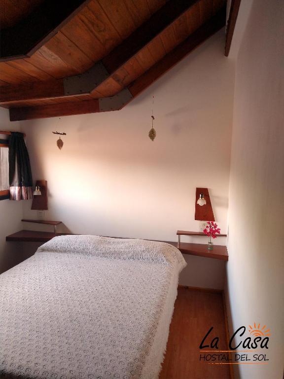 Postel nebo postele na pokoji v ubytování La casa de Hostal del Sol