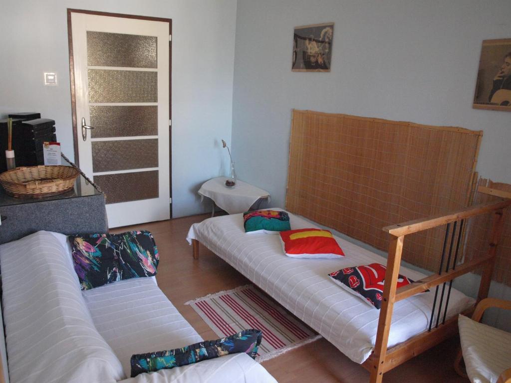 Postel nebo postele na pokoji v ubytování Apartmány Rossa