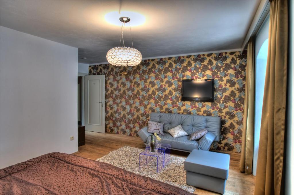 Postel nebo postele na pokoji v ubytování Hotel Peregrin