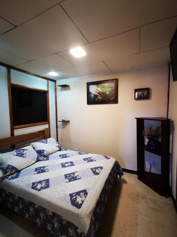 Postel nebo postele na pokoji v ubytování Toucan Hostel