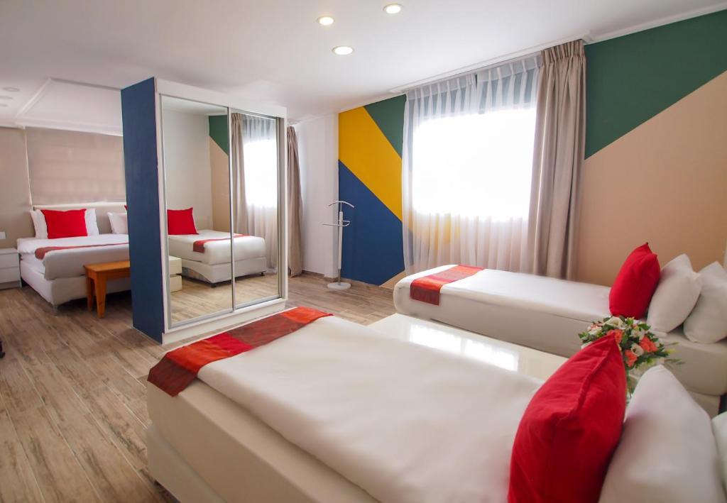 Postel nebo postele na pokoji v ubytování Paamonim Hotel Jerusalem