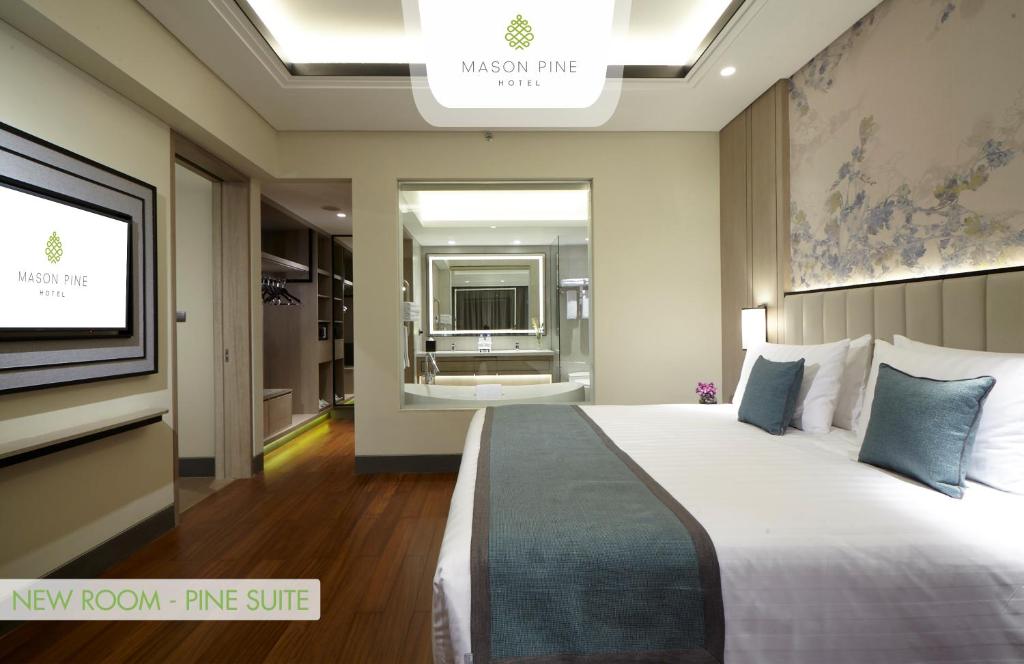 Letto o letti in una camera di Mason Pine Hotel Bandung