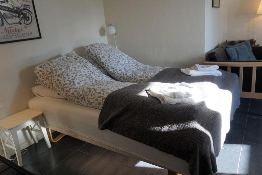 Postel nebo postele na pokoji v ubytování Kerteminde Byferie - Hyrdevej 83, 85K