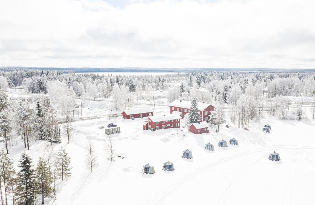 an aerial view of a resort in the snow at Arctic Guesthouse & Igloos in Ranua