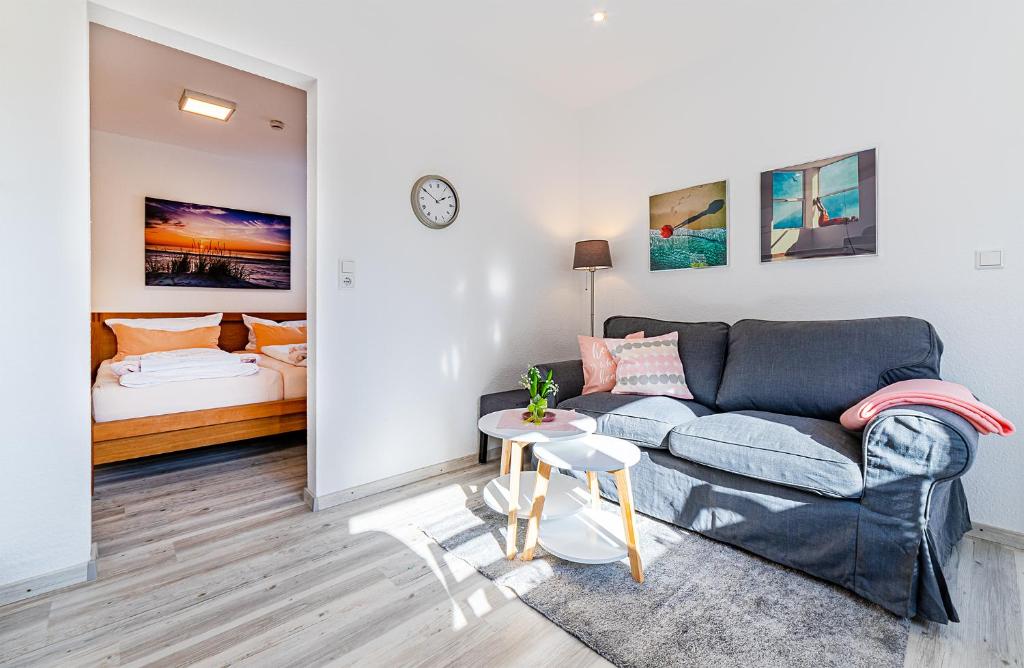 Postel nebo postele na pokoji v ubytování Haus Pirola Bensersiel