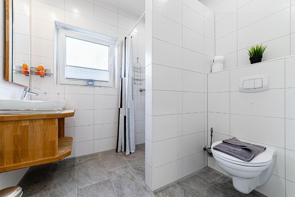 Koupelna v ubytování Haus Pirola Bensersiel