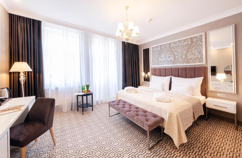 Postel nebo postele na pokoji v ubytování Spa Hotel ULRIKA