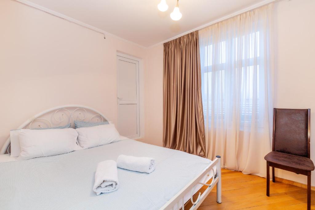 Postel nebo postele na pokoji v ubytování Guesthouse Alvani