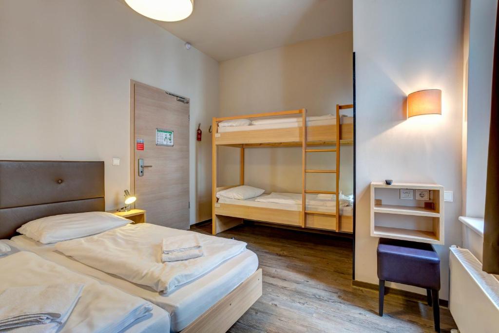 Postel nebo postele na pokoji v ubytování MEININGER Hotel Berlin Mitte