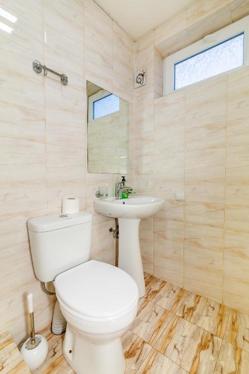 Koupelna v ubytování Guesthouse Alvani