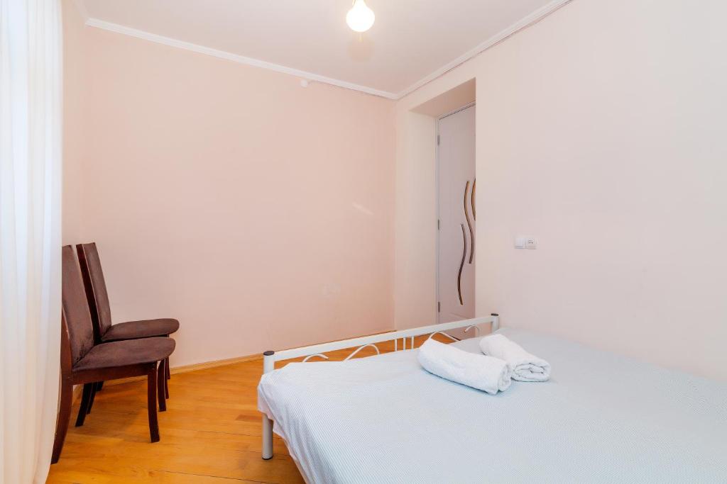 Postel nebo postele na pokoji v ubytování Guesthouse Alvani