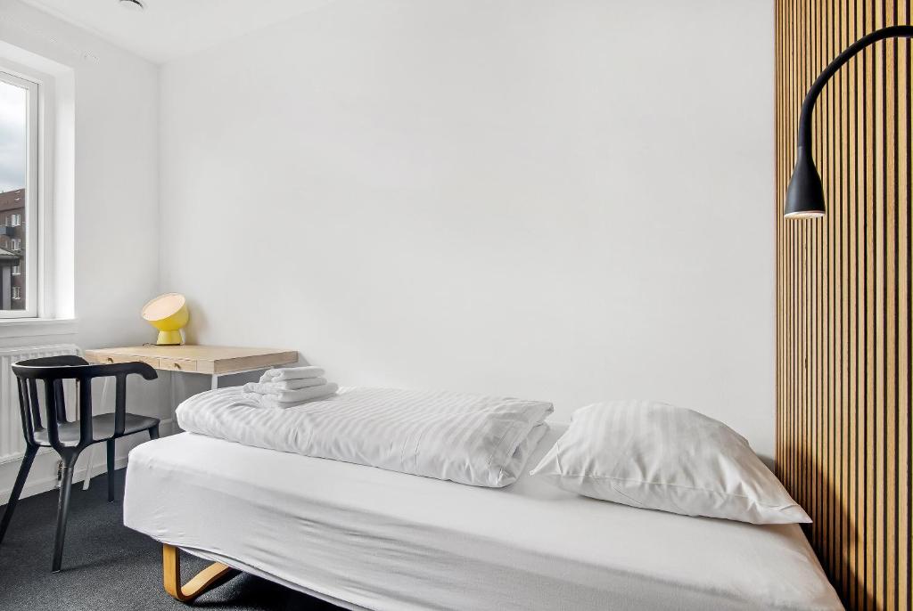 Llit o llits en una habitació de Sleepcph