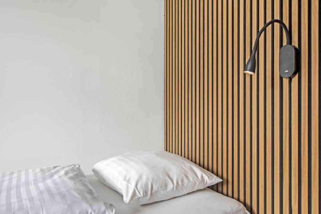 Llit o llits en una habitació de Sleepcph