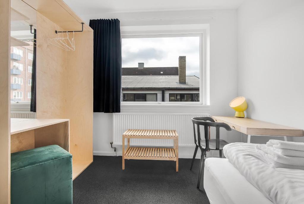 Llit o llits en una habitació de Sleepcph