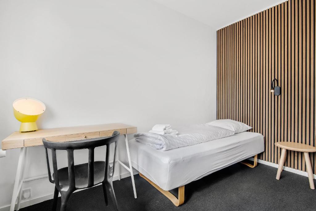 Llit o llits en una habitació de Sleepcph