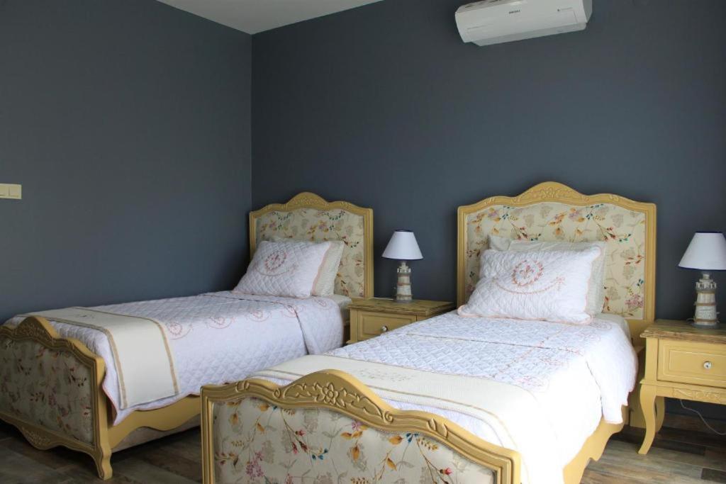 Postel nebo postele na pokoji v ubytování Nilüfer Butik Otel