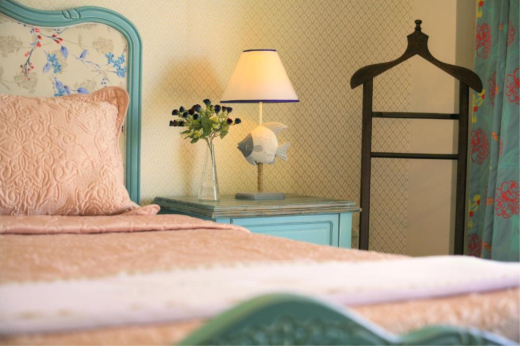 Postel nebo postele na pokoji v ubytování Nilüfer Butik Otel