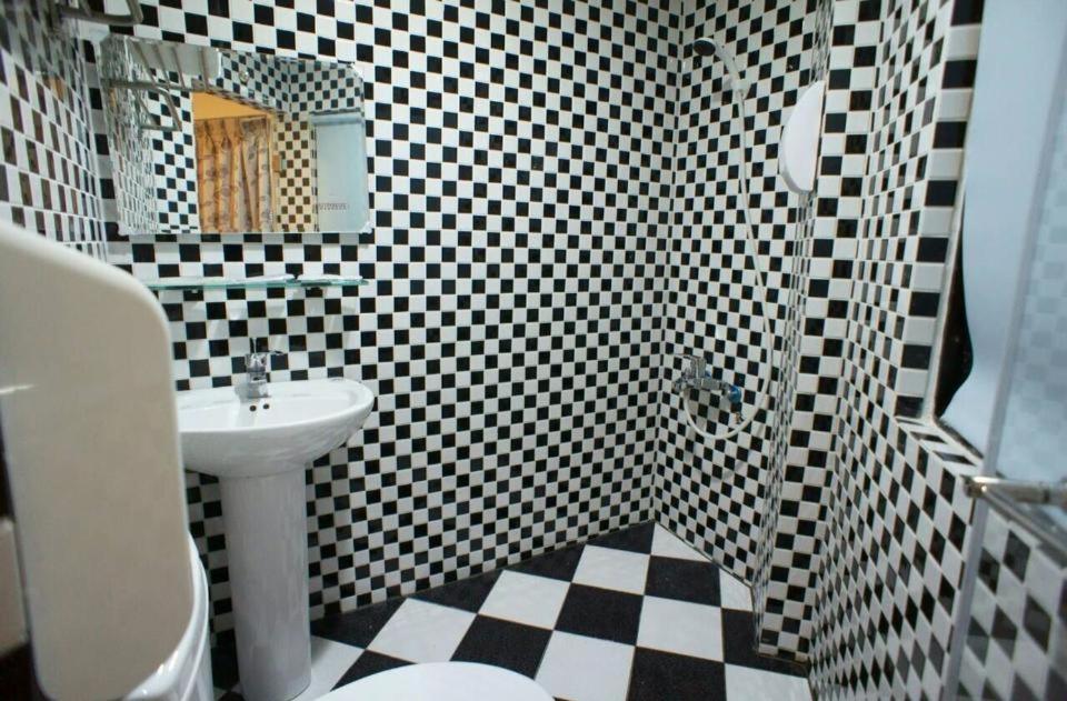 Koupelna v ubytování Galaxy Mini Inn