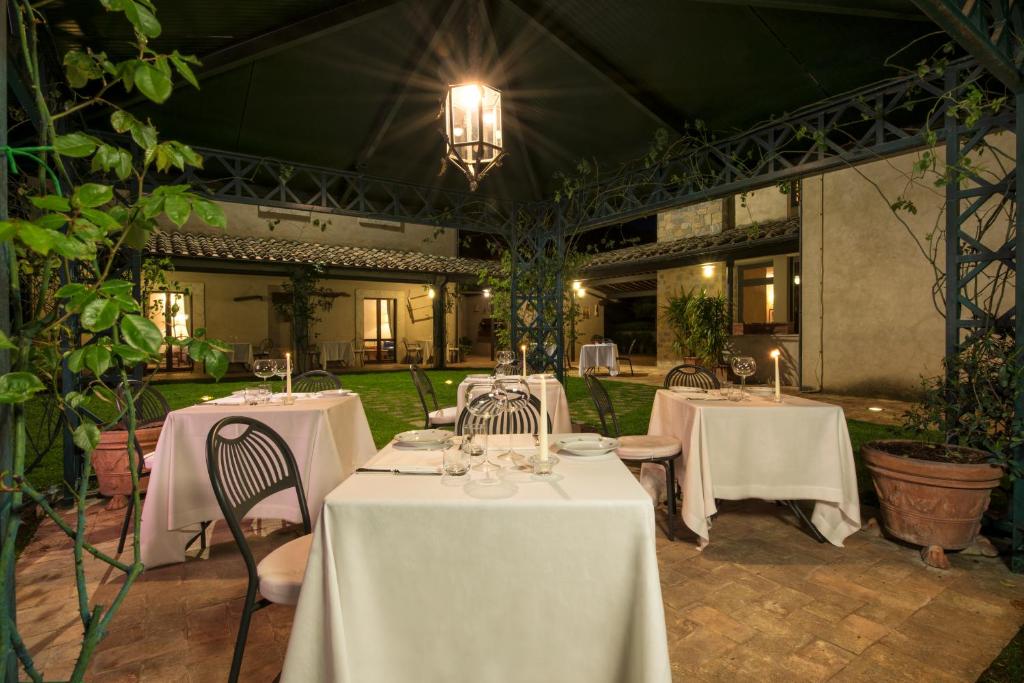 Reštaurácia alebo iné gastronomické zariadenie v ubytovaní Relais Osteria Dell'Orcia